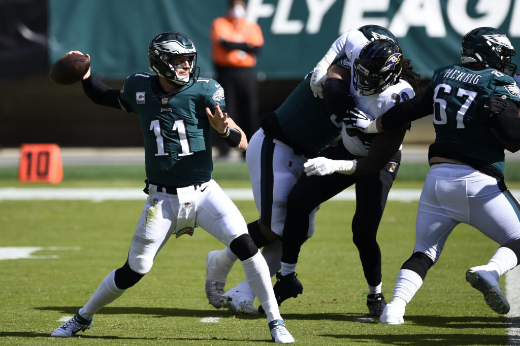 Ravens Eagles Football Carson Wentz passes during the first half of the Eagles-Ravens game