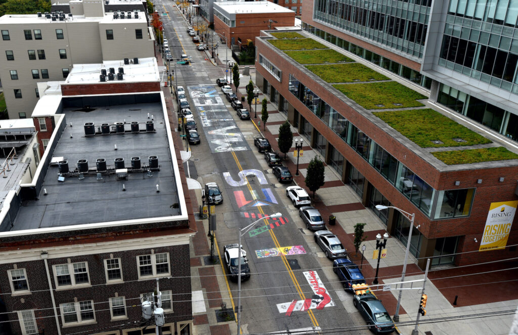 BLMcamden1 Part of the Black Lives Matter sign that was painted in Camden a few days earlier on Oct. 23. (April Saul for WHYY)