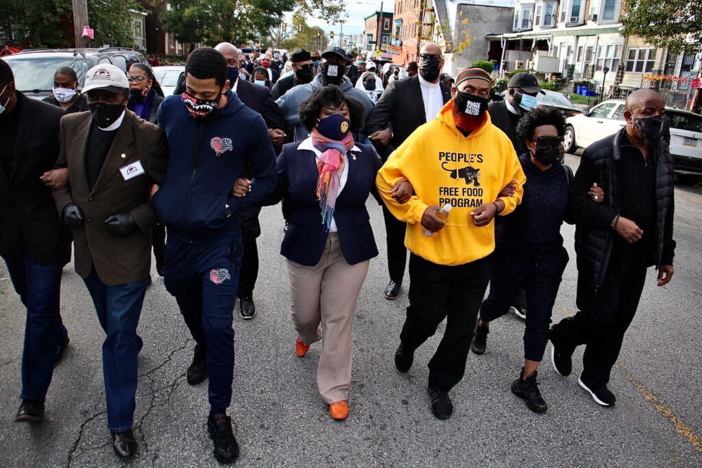 Image from iOS (188) Community leaders and members of the clergy lead a march on Locust Street from the site where Walter Wallace Jr. was killed to the police precinct at 55th and Pine streets.