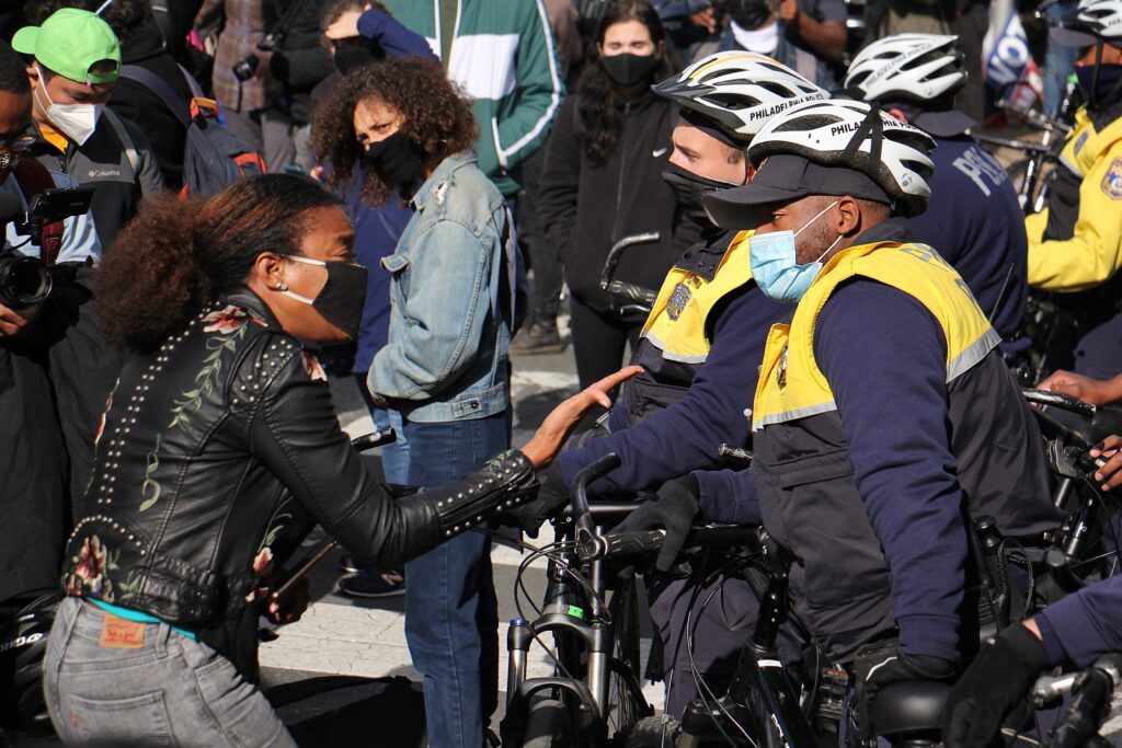 FILE - A protester yells at police who blocked a march on Pine Street. (Emma Lee/WHYY)