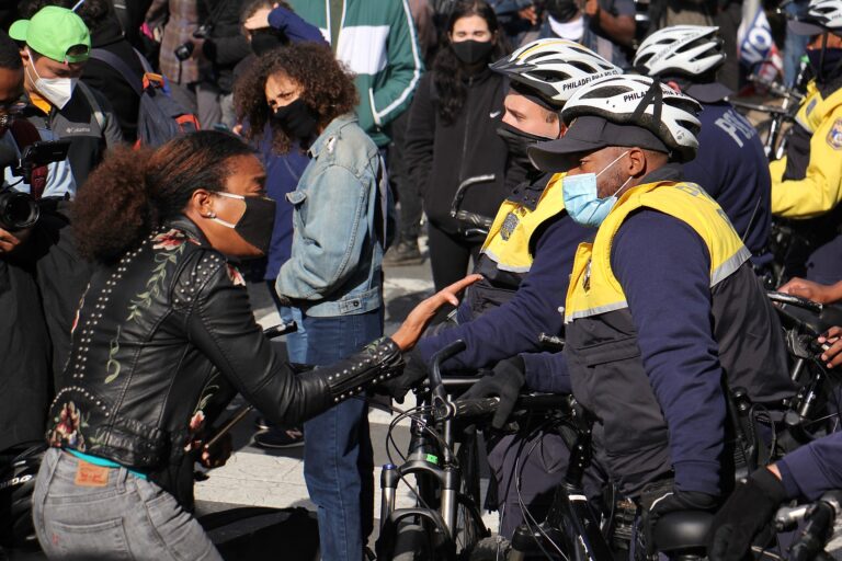 FILE - A protester yells at police who blocked a march on Pine Street. (Emma Lee/WHYY)