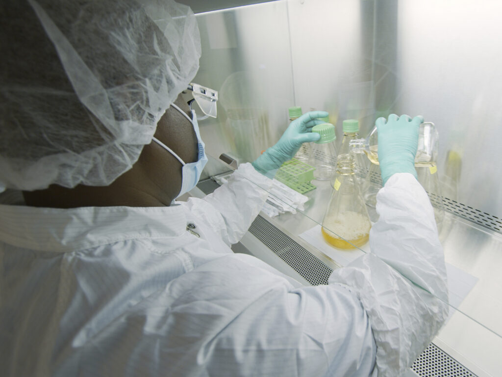 An Eli Lilly researcher tests possible COVID-19 antibodies in a laboratory in Indianapolis. An Eli Lilly researcher tests possible COVID-19 antibodies in a laboratory