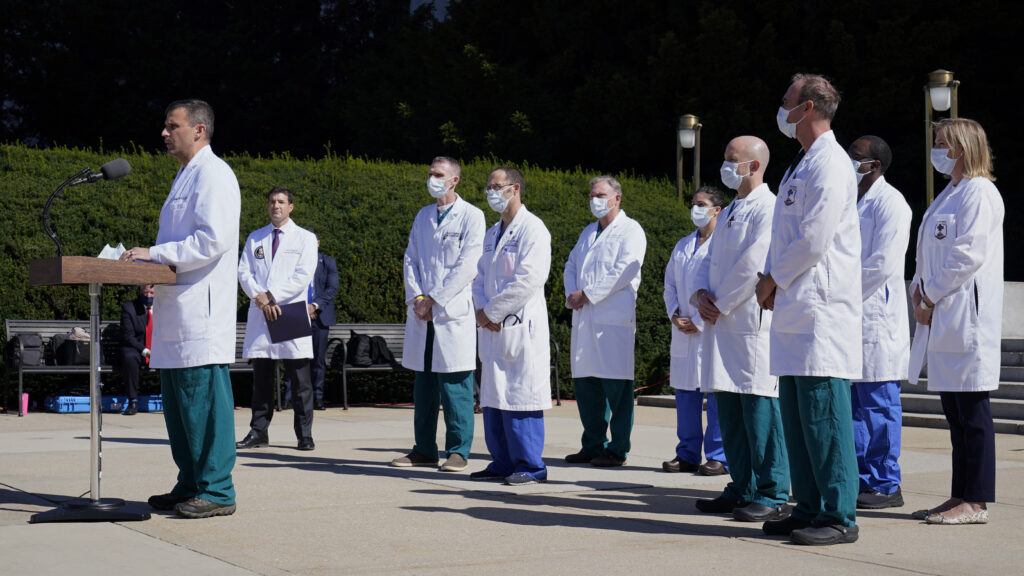 Dr. Sean Dooley briefs reporters at Walter Reed National Military Medical Center in Bethesda, Md. on Saturday. Trump was admitted to the hospital after contracting the coronavirus. Dr. Sean Dooley briefs reporters at Walter Reed National Military Medical Center in Bethesda, Md. on Saturday. Trump was admitted to the hospital after contracting the coronavirus. (Susan Walsh/AP Photo)