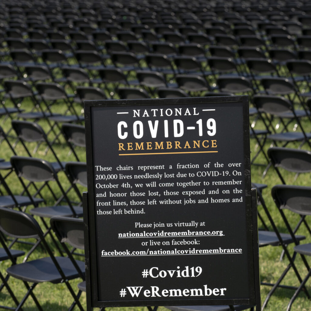 Virus Outbreak Washington Hundreds of empty chairs who represent a fraction of the more than 200,000 lives lost due the COVID-19 are seen during the National COVID-19 Remembrance, at The Ellipse outside of the White House, Sunday, Oct. 4, 2020, in Washington. (AP Photo/Jose Luis Magana)