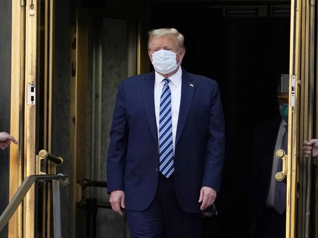 President Trump walks out of Walter Reed National Military Medical Center Monday. President Trump walks out of Walter Reed National Military Medical Center Monday.