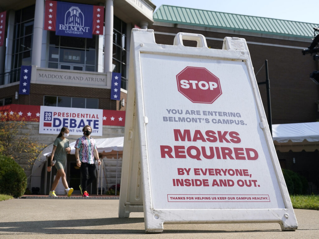 In Nashville, Tenn., a sign reminds visitors to wear masks at Belmont University, which is preparing to host Thursday’s presidential debate. In Nashville, Tenn., a sign reminds visitors to wear masks at Belmont University, which is preparing to host Thursday's presidential debate.