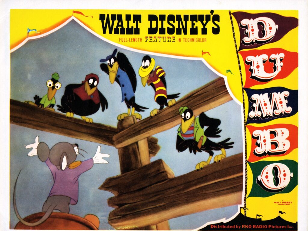 Disney added a warning on its streaming service to some of its titles with racist depictions, including Dumbo. The crows’ appearance and musical number in the movie “pay homage to racist minstrel shows,” Disney said. Dumbo, lobbycard, 1941. (Photo by LMPC via Getty Images)