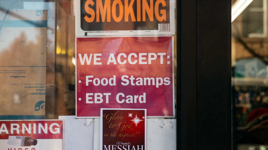 A federal judge has tossed out a controversial USDA rule that would have limited food stamps, noting that during the pandemic, “SNAP rosters have grown by over 17 percent with over 6 million new enrollees.” Here, a sign alerts customers about SNAP food stamp benefits at a Brooklyn store in New York City.