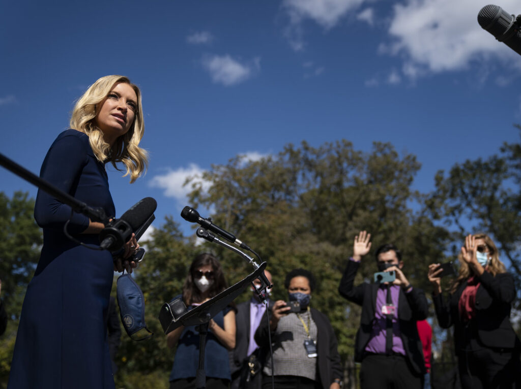 White House press secretary Kayleigh McEnany talks to reporters last week outside the West Wing of the White House. She announced Monday that she tested positive for the coronavirus. White House press secretary Kayleigh McEnany