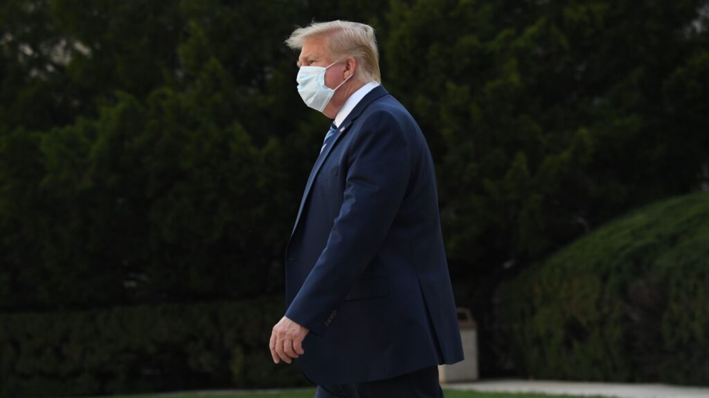 President Trump leaves Walter Reed National Military Medical Center in Bethesda, Md., on Monday. He announced Tuesday he was pausing negotiations on a coronavirus relief package. President Trump leaves Walter Reed National Military Medical Center in Bethesda, Md., on Monday. He announced Tuesday he was pausing negotiations on a coronavirus relief package. (Saul Loeb/AFP via Getty Images)