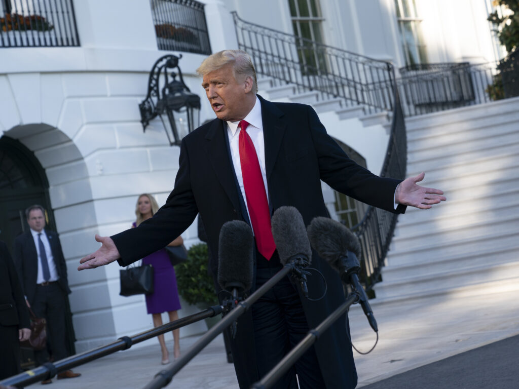 U.S. President Donald Trump speaks to members of the media