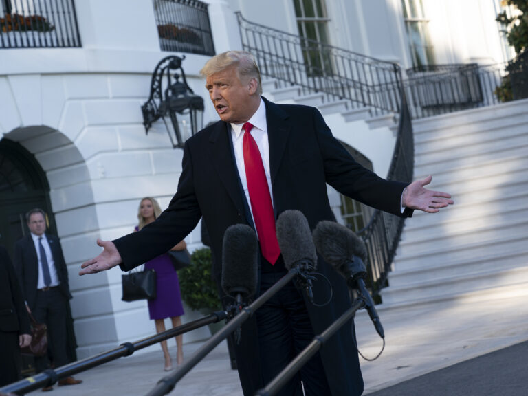 U.S. President Donald Trump speaks to members of the media