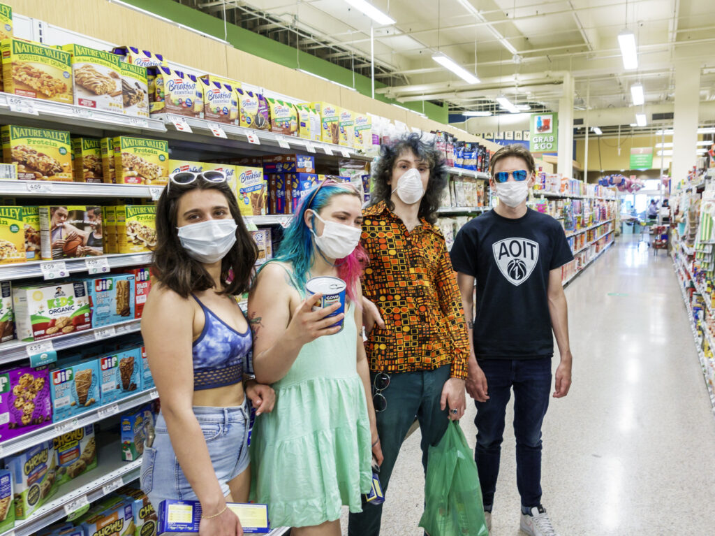 Miami Beach, Teens in face masks shopping at Publix, grocery store Teens in face masks shopping at Publix, grocery store