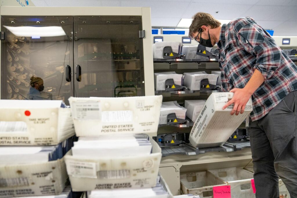 mail_ballots_margo_reed_inky_102220 An elections worker organizes mail ballots in Chester County