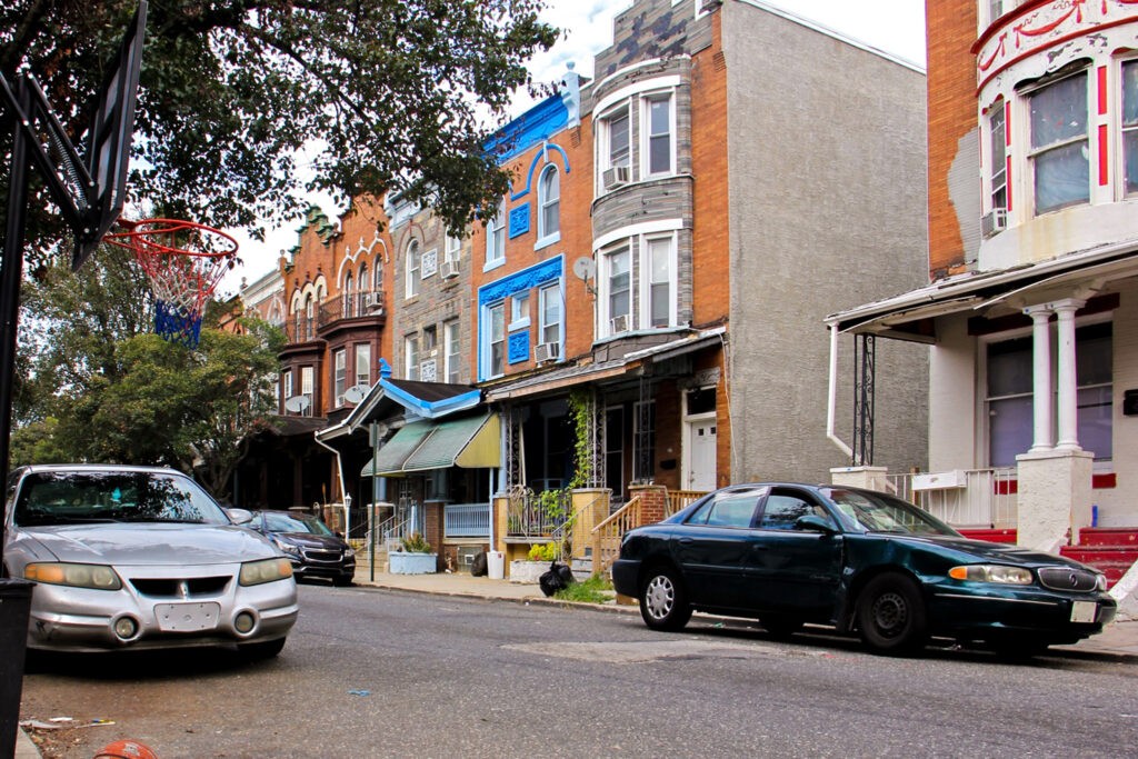 2019 10 02-e lee-philadelphia n 15th st-shooting aftermath bulle Rowhomes in Nicetown, Philadelphia are visible.
