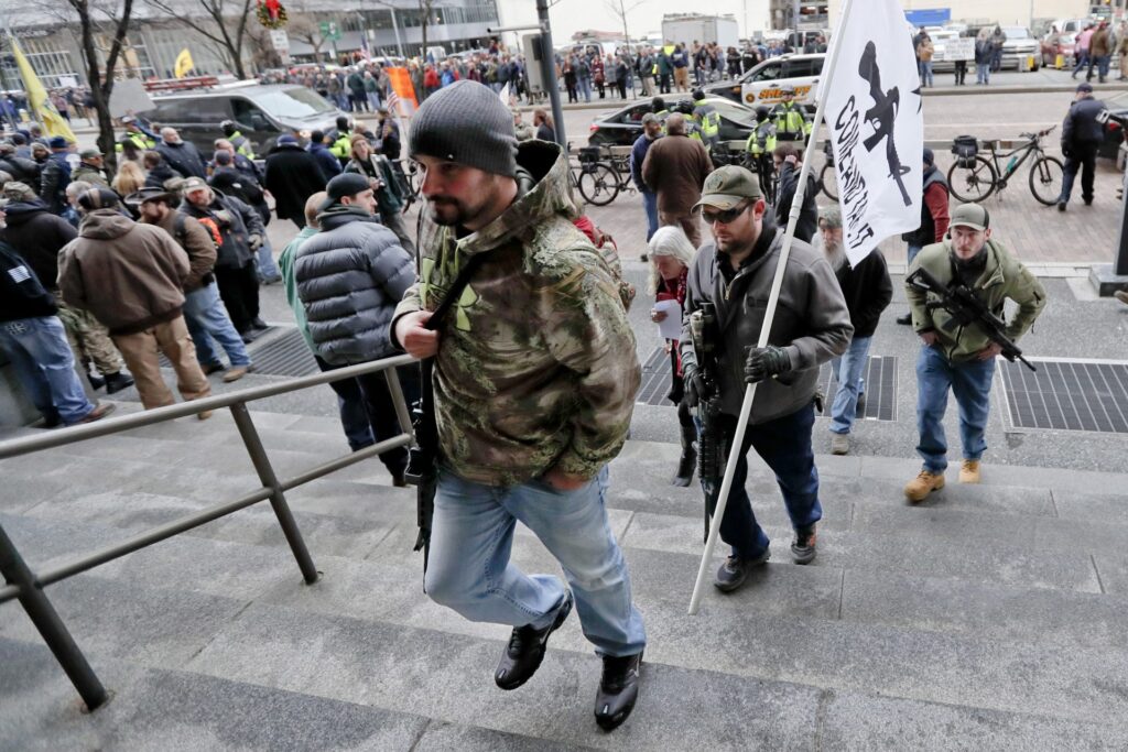 pittsbugh-gun-restrictions-1920×1280 Protestors carrying rifles walk up the steps for a rally at the City County building on Monday, Jan. 7, 2019, in Pittsburgh. The protesters, many openly carrying guns, gathered in downtown Pittsburgh to rally against the city council's proposed restrictions and banning of semi-automatic rifles, certain ammunition and firearms accessories within city limits. (Keith Srakocic / AP Photo)