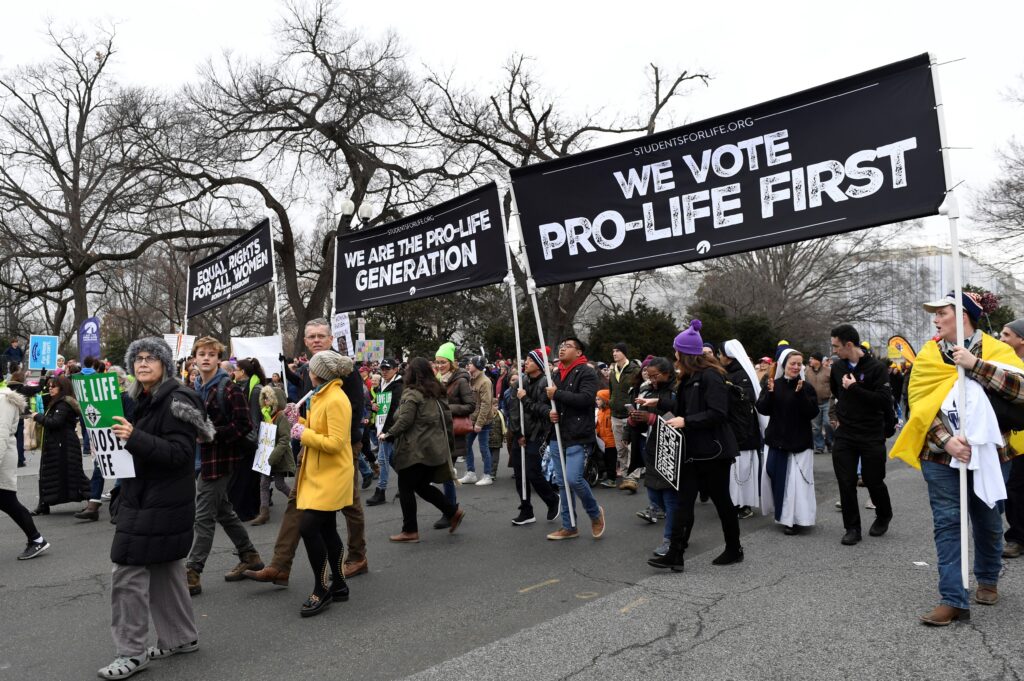Anti-abortion-rights activists participate in the March for Life rally near the Supreme Court in Washington, D.C., on Jan. 24. Anti-abortion-rights activists participate in the March for Life rally near the Supreme Court in Washington, D.C., on Jan. 24. (Susan Walsh/AP Photo)
