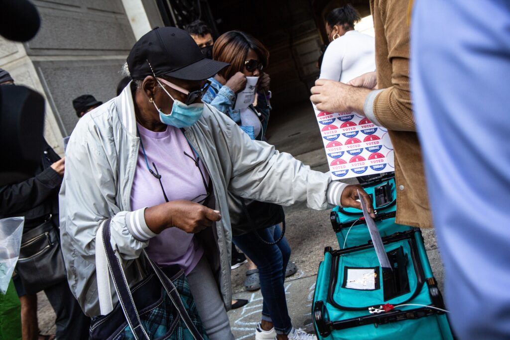 satellite_election_office_city_hall_KP_101520_01 Jean Gary drops off her ballot at City Hall