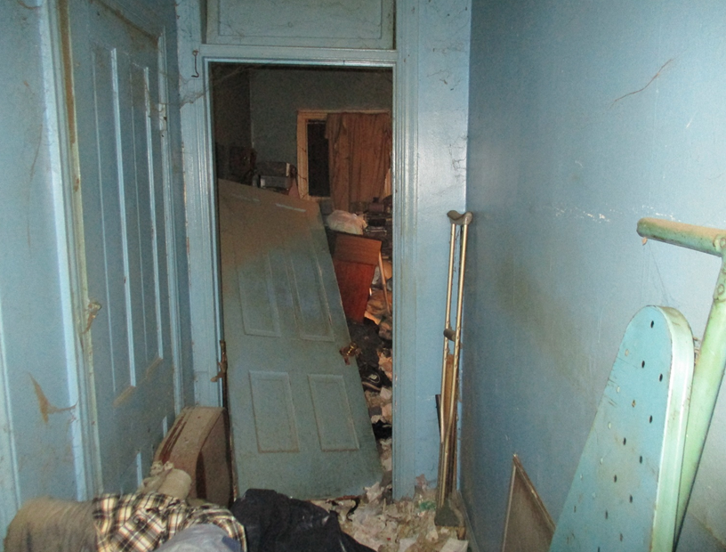 A rental property is shown in disarray