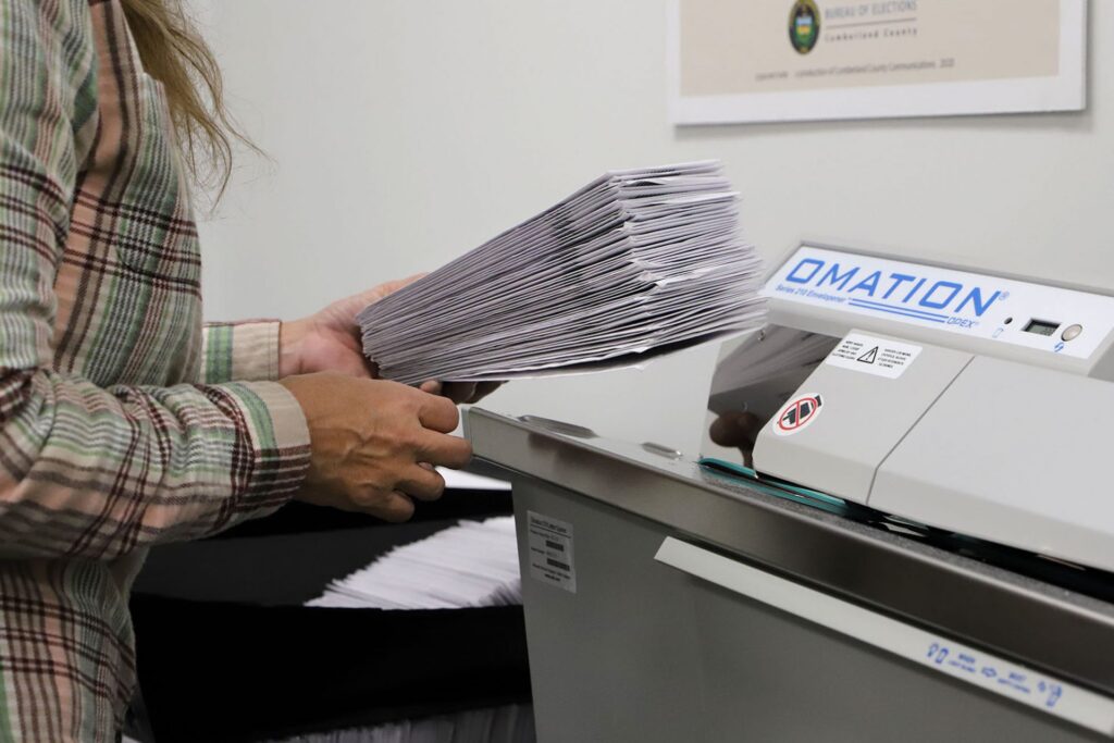 02.-2020-Election-Counting-.-IMG_9677-1920×1280 A worker processes mail-in ballots at the Cumberland County Bureau of Elections on Nov. 4, 2020.