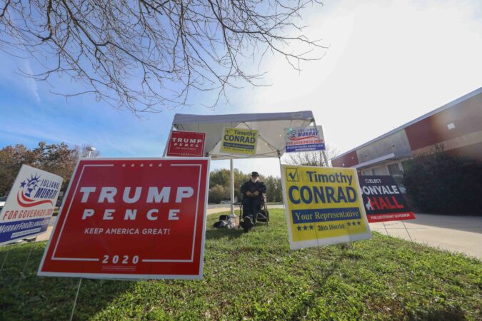 Campaign signage is displayed on election day Tuesday, Nov. 03, 2020, at Thurgood Marshall Elementary School in Newark, Del.(Saquan Stimpson for WHYY)