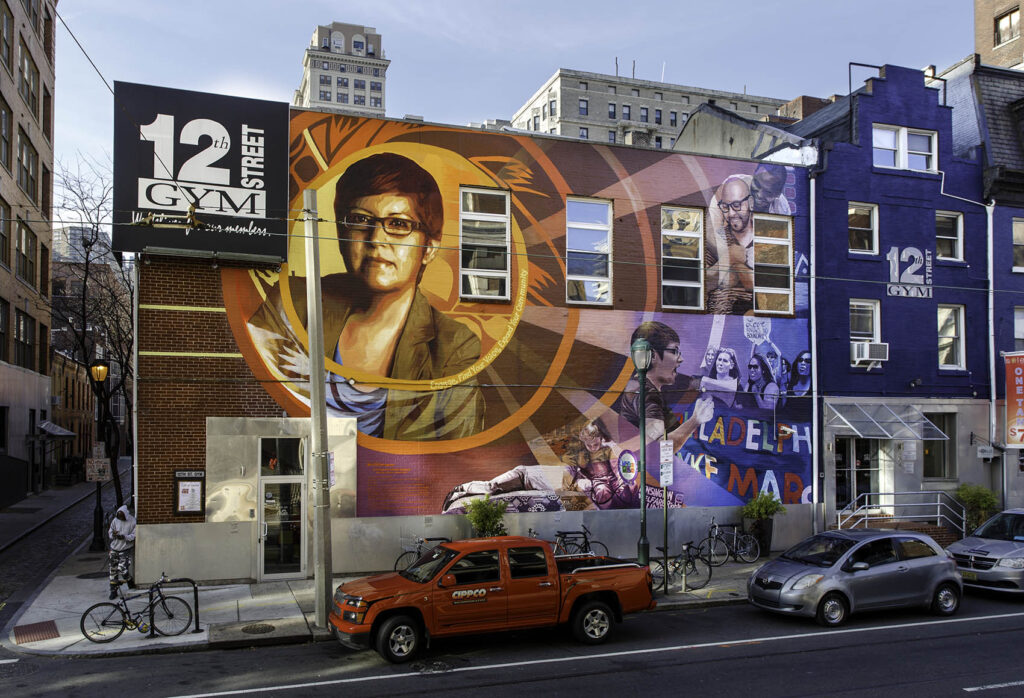 2015-084_Tribute_to_Gloria_Casarez_01-copy The Gloria Casarez mural by Michelle Angela Ortiz at 12th and Locust streets was painted over on Wednesday, December 23, 2020. (Photo by Steve Weinik/Mural Arts)