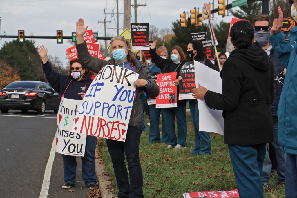 2020 11 17-e lee-lancaster st mary medical center-nurses strike 1 Nurses picket at the entrance to St Mary Medical Center in Langhorne, Pa. About 800 nurses went on strike on Nov. 17 citing long simmering grievances over wages and staffing levels. They returned to work after a two-day walkout. (Emma Lee/WHYY)