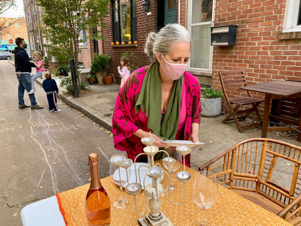 2020 11 25-provided-martha rich-south philly-outdoor thanksgiving 3 Martha Rich sets up tables to share with her neighbors on her street in South Philly.