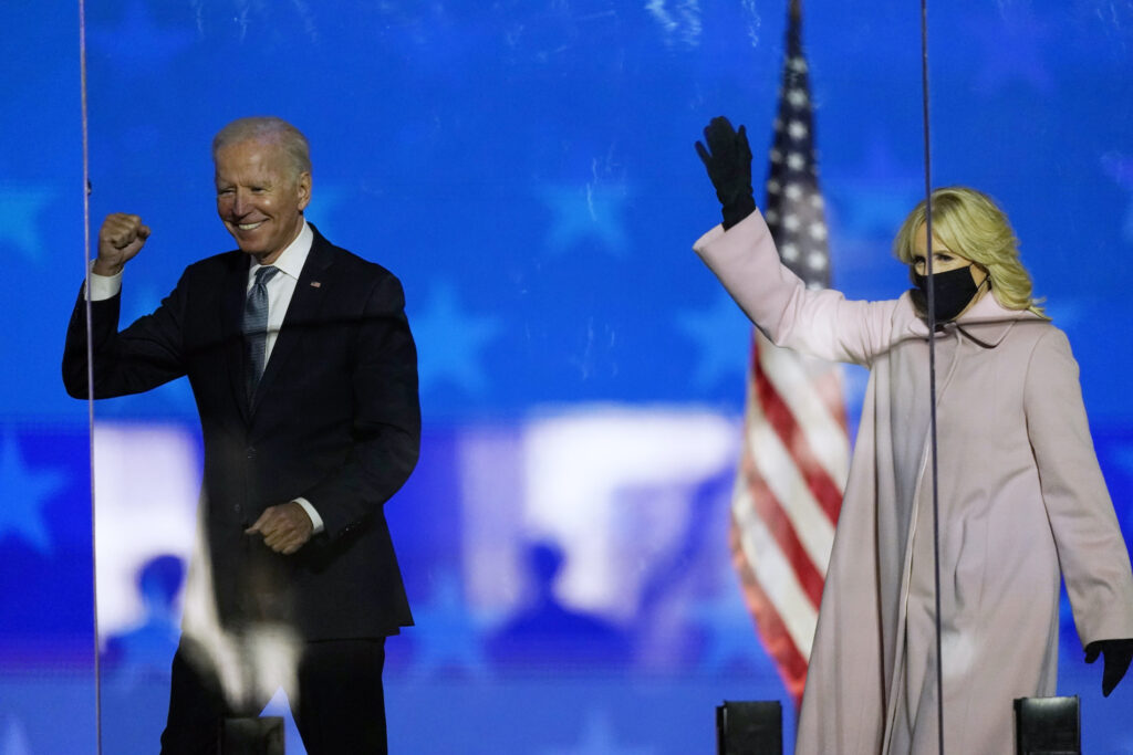 Joe Biden Democratic presidential candidate former Vice President Joe Biden and his wife Jill Biden wave to supporters, Tuesday, Nov. 3, 2020, in Wilmington, Del. (AP Photo/Andrew Harnik)