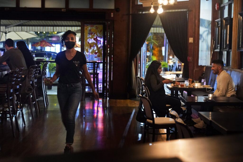 Virus Outbreak New Jersey Patrons dine at The Brass Rail in Hoboken, N.J.