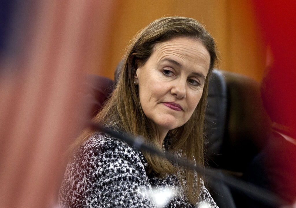 This Dec. 7, 2011 file photo shows former U.S. Defense Undersecretary Michele Flournoy, preparing for a bilateral meeting in Beijing, China. (AP Photo/Andy Wong)