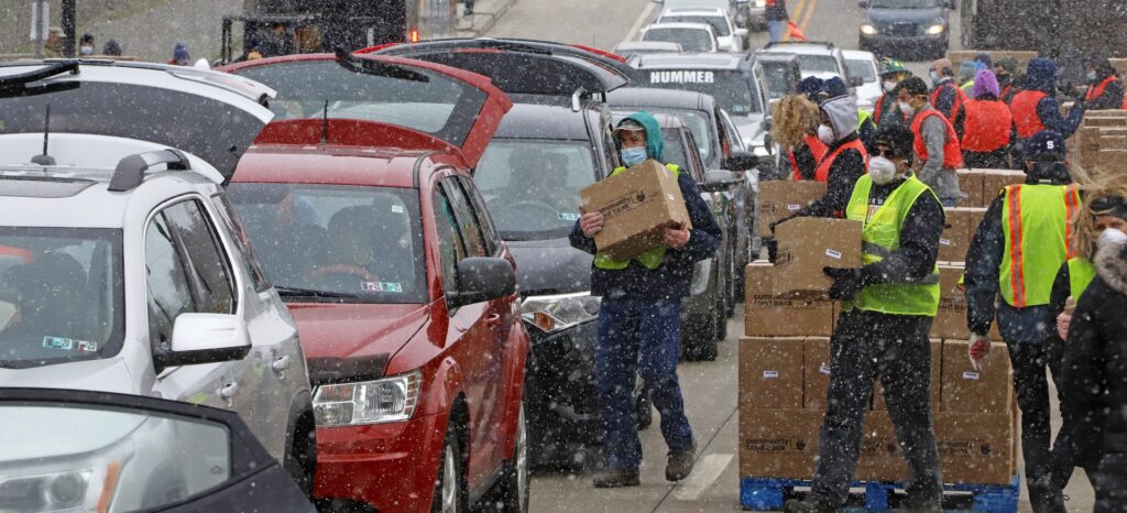 AP_20101578801059-e1586614195592-1920×874 Boxes of food are distributed by the Greater Pittsburgh Community Food Bank, at a drive thru distribution