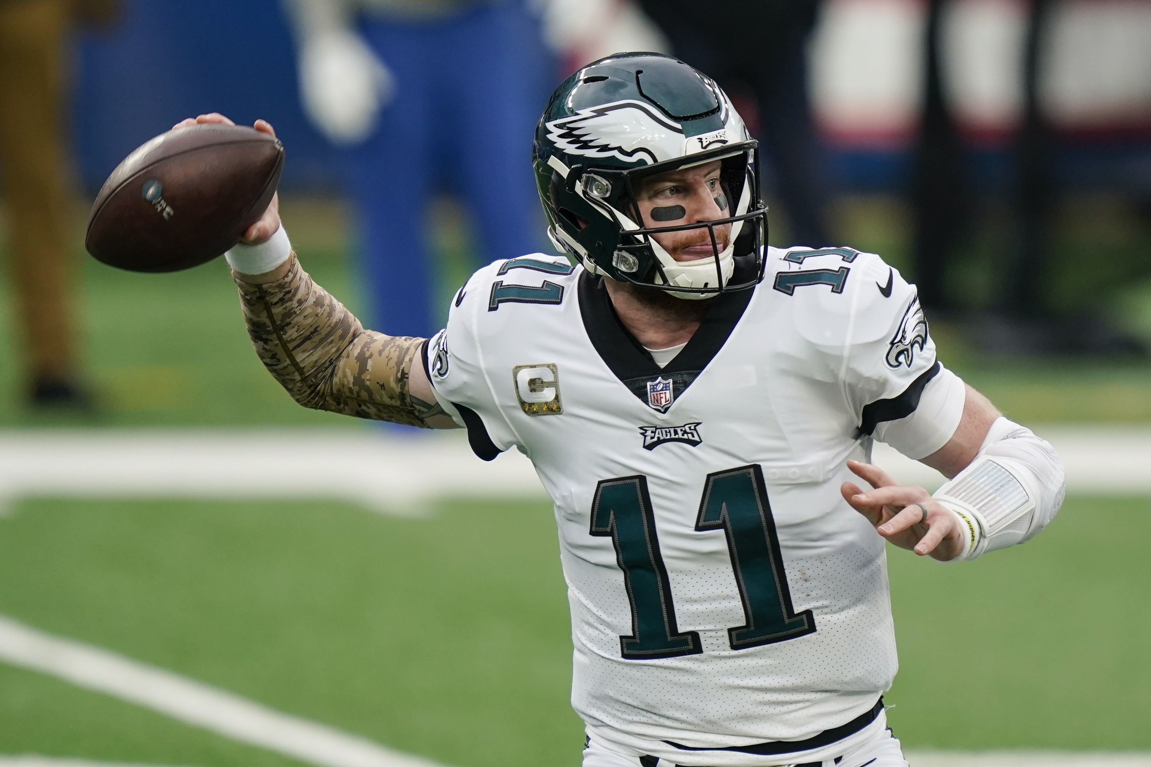 Eagles quarterback Carson Wentz throws a pass during the first half