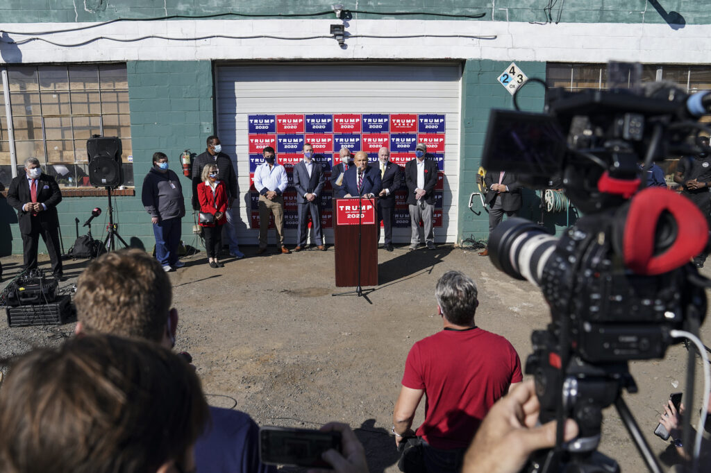 Former New York mayor Rudy Giuliani, a lawyer for President Donald Trump, speaks during a news conference at Four Seasons Total Landscaping on legal challenges to vote counting in Pennsylvania.