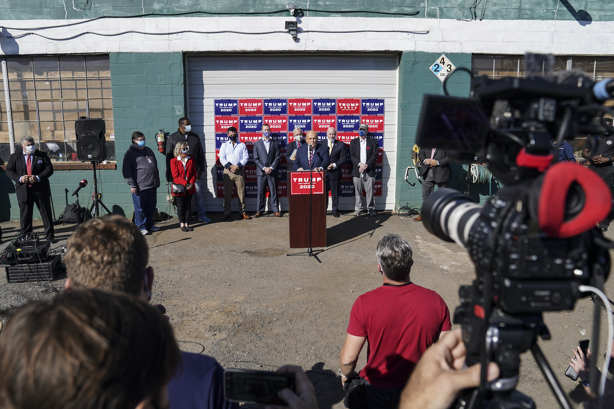 Former New York mayor Rudy Giuliani, a lawyer for President Donald Trump, speaks during a news conference at Four Seasons Total Landscaping on legal challenges to vote counting in Pennsylvania.