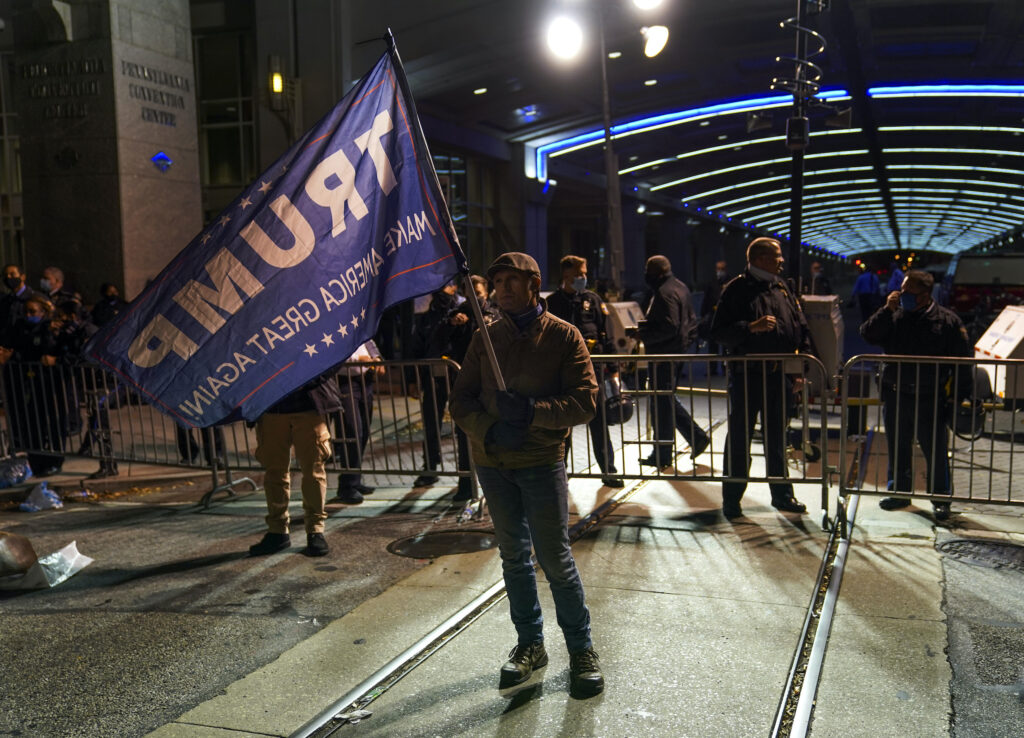 Election 2020 Protests Philadelphia A Trump supporter stands outside the Pennsylvania Convention Center