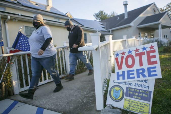 Polls open at 6 A.M in Cherry Hill, NJ in the midst of the Coronavirus pandemic to vote in person, Tuesday, November 3, 2020. (Miguel Martinez for WHYY)