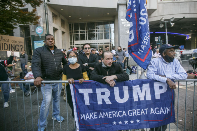 Trump supporters stand outside Philadelphia Convention Center