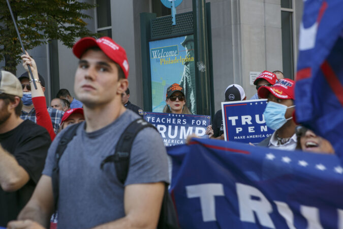 Trump supporters stand outside Philadelphia Convention Center