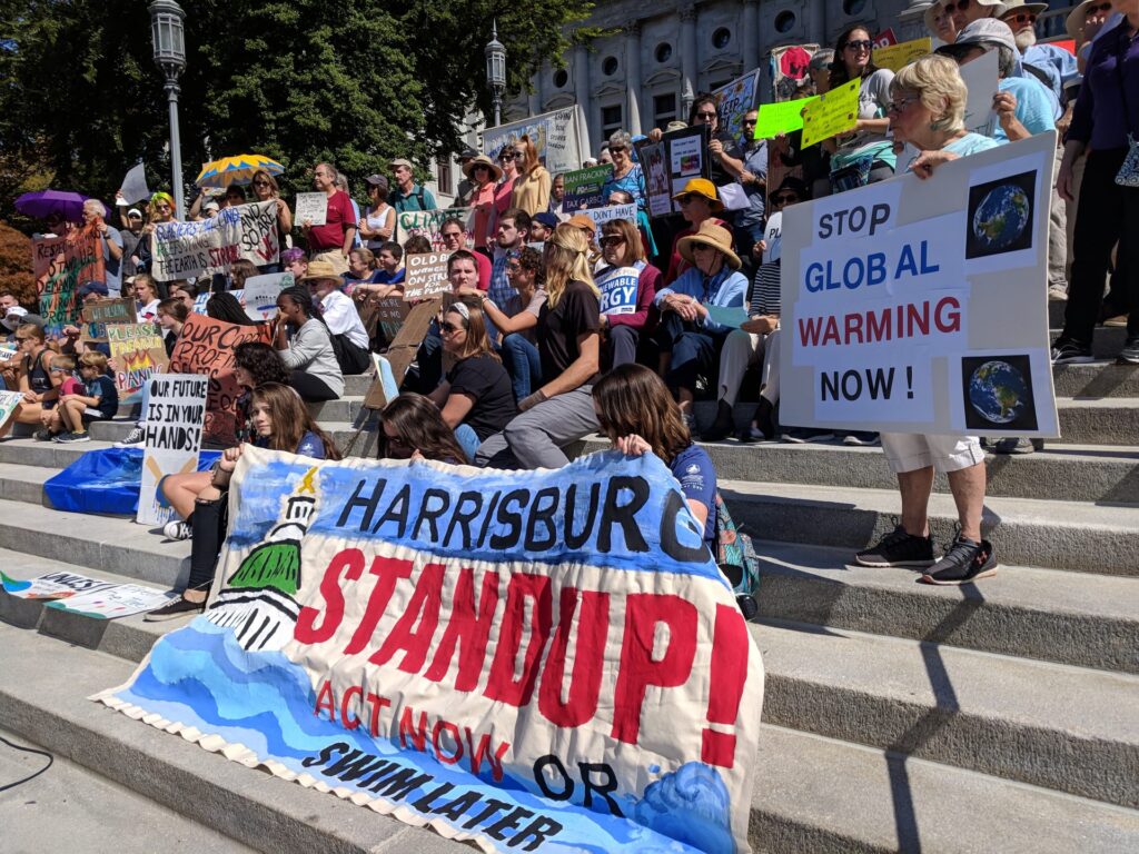 IMG_20190920_121128-1920×1440 Demonstrators gather on the steps of the state capitol in Harrisburg to demand action on climate change on Friday, Sept. 20, 2019. (Rachel McDevitt/WITF)
