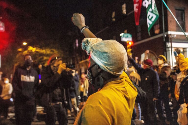 Protesters raised a fist in honor of Walter Wallace Jr. on the eve of the release of officer body cam footage of Wallace’s shooting. (Kimberly Paynter/WHYY)