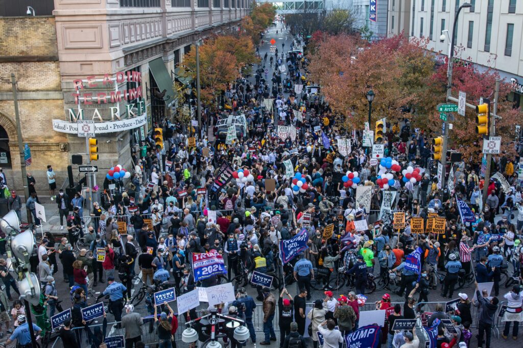 Image from iOS (218) At 12th and Arch Streets in Philadelphia, protesters from both sides were separated by a line of police. (Kimberly Paynter/WHYY)