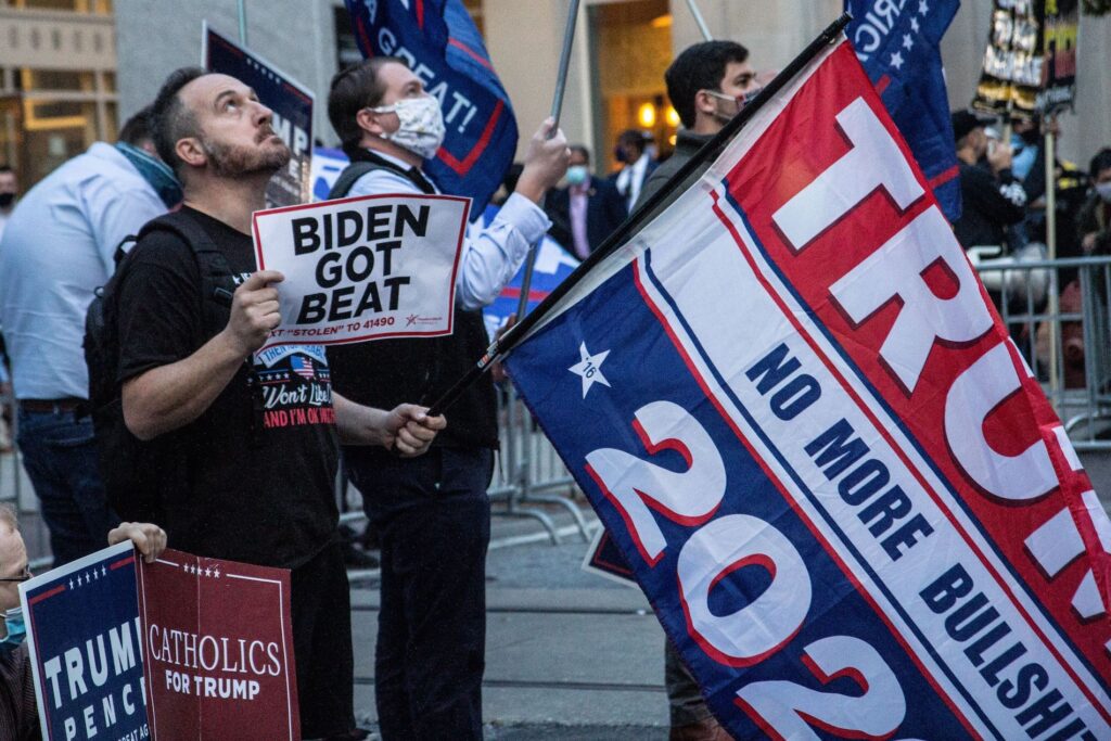 Image from iOS (219) About two dozen protesters gathered outside Philadelphia's vote counting headquarters in support of President Trump. (Kimberly Paynter/WHYY