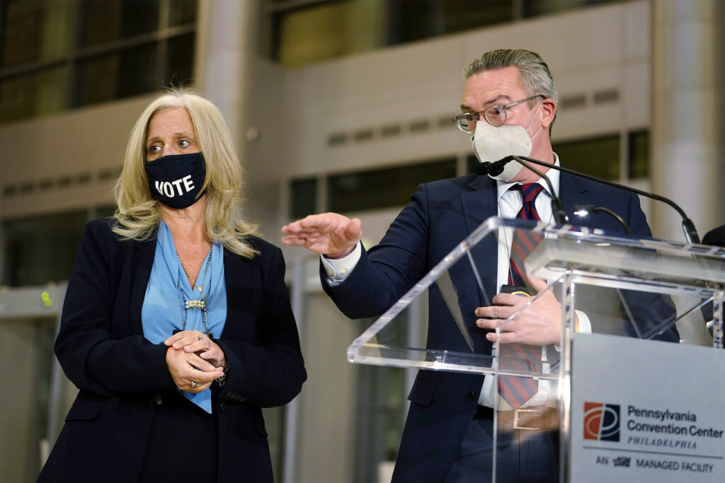 Election 2020 Pennsylvania Voting Philly City Commissioners Al Schmidt and Lisa Deeley speak to the media as election workers process ballots at the Pa. Convention Center on Election Day 2020. (AP Photo/Matt Slocum)