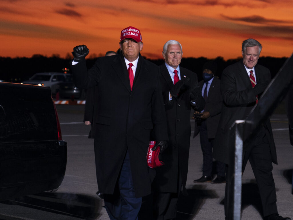 Mark Meadows, right, traveled with President Trump and Vice President Pence in the homestretch of the campaign, including to a rally in Traverse City, Mich. on Nov. 2. Mark Meadows, right, traveled with President Trump and Vice President Pence in the homestretch of the campaign, including to a rally in Traverse City, Mich. on Nov. 2.