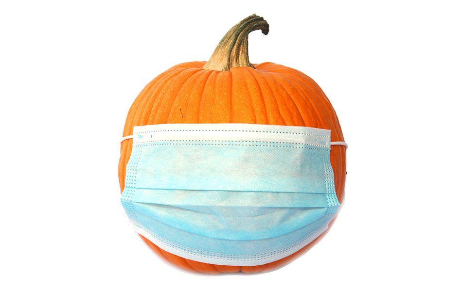 Covid-19 Halloween Pumpkin. Halloween Pumpkin with a Medical Fac Pumpkin with a Medical Face Mask