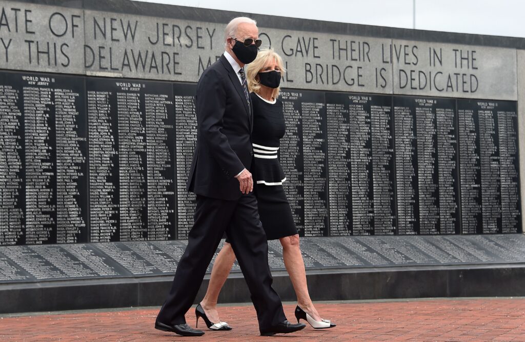 Joe Biden and his wife Jill Biden wear masks as they mark Memorial Day, on May 25. The president-elect has consistently worn masks amid the pandemic, and is calling for a national mask mandate. Joe Biden and his wife Jill Biden wear masks as they mark Memorial Day, on May 25. The president-elect has consistently worn masks amid the pandemic, and is calling for a national mask mandate. (Olivier Douliery/AFP via Getty Images)