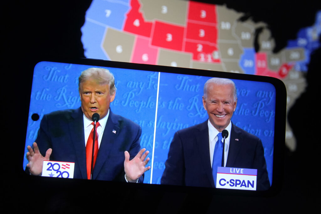 Some major final steps for the 2020 census are set to take place during the transition from President Trump to President-elect Joe Biden, who appear on a smartphone displaying the final presidential debate in October. In this photo illustration the US President Donald Trump and Democratic presidential candidate and former US Vice President Joe Biden are seen during the final presidential debate displayed on a screen of a smartphone. (Photo Illustration by Pavlo Conchar/SOPA Images/LightRocket via Getty Images)