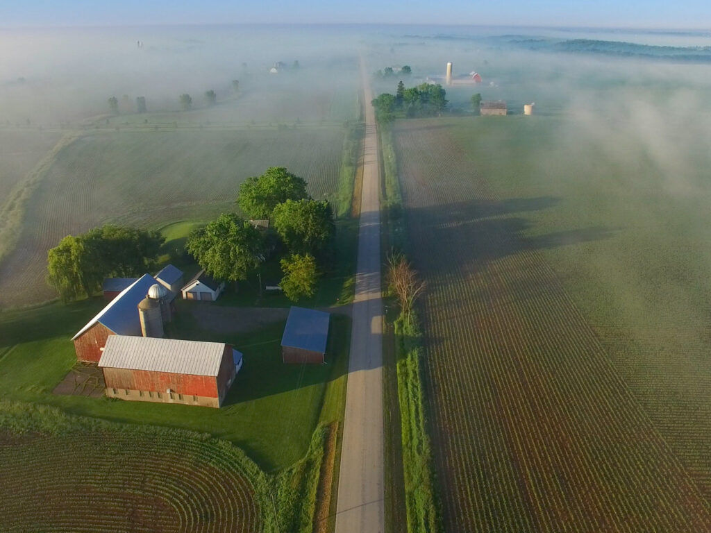 Scenic aerial view of rural Wisconsin on foggy spring morning. Perfectly scenic aerial view of rural Wisconsin on a foggy spring morning.