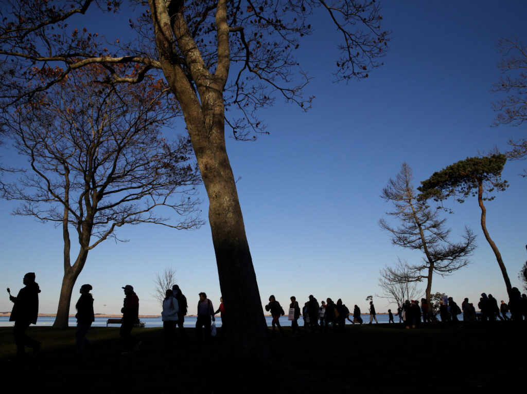 Marchers perform a Stomp Dance in Pilgrim Memorial State Park